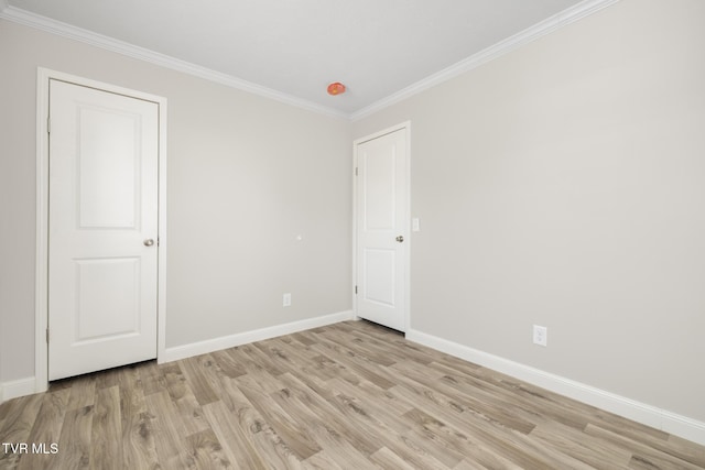 1024 Walnut Ave, Kingsport, TN 37660 - unfurnished bedroom featuring light wood finished floors and crown molding