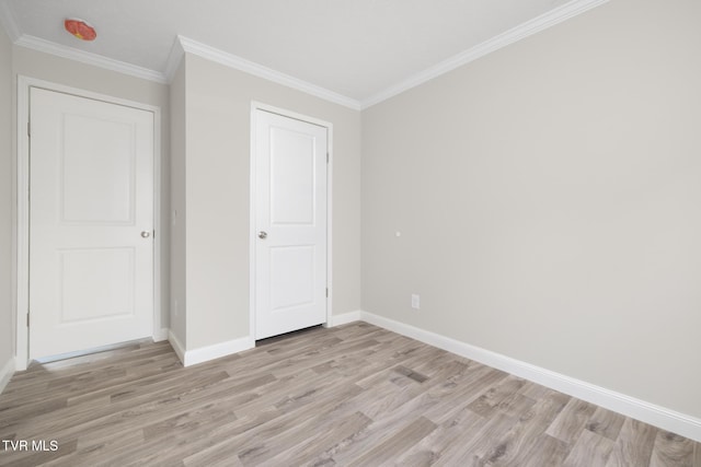 1024 Walnut Ave, Kingsport, TN 37660 - unfurnished bedroom with light wood-type flooring and crown molding