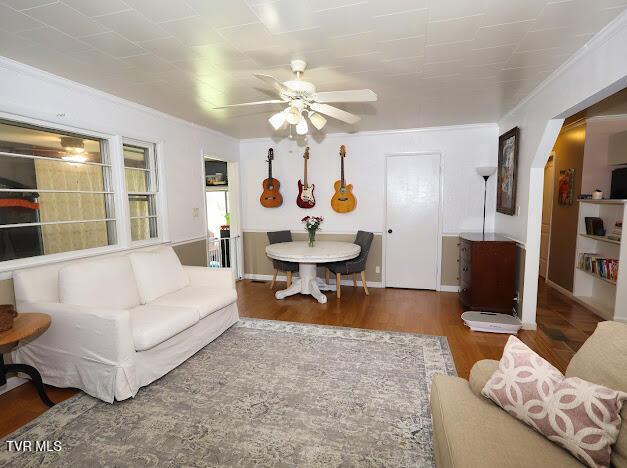 8087 Baptist Valley Rd, North Tazewell, VA 24630 - living room featuring ceiling fan and wood finished floors