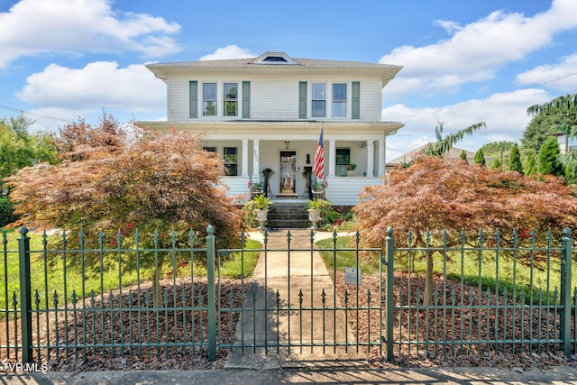 201 W Wanola Ave, Kingsport, TN 37660 - american foursquare style home featuring a porch and a fenced front yard