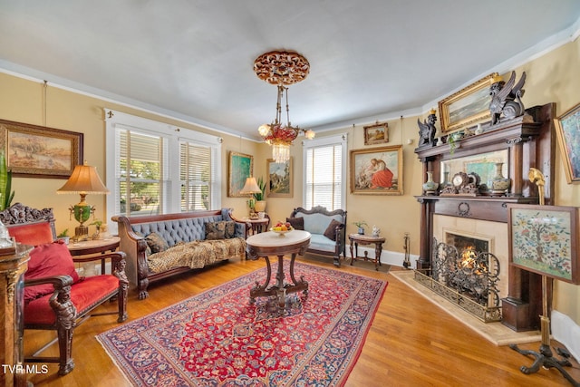 201 W Wanola Ave, Kingsport, TN 37660 - living room featuring crown molding, a lit fireplace, and wood finished floors