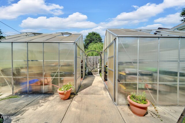 201 W Wanola Ave, Kingsport, TN 37660 - view of side of property featuring a greenhouse and an outdoor structure