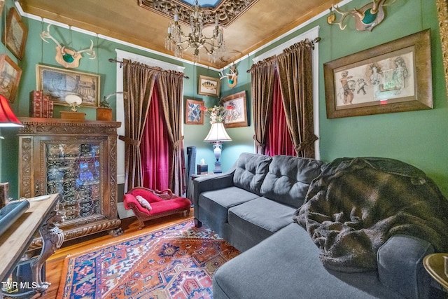 201 W Wanola Ave, Kingsport, TN 37660 - living room with a chandelier, wood finished floors, and ornamental molding