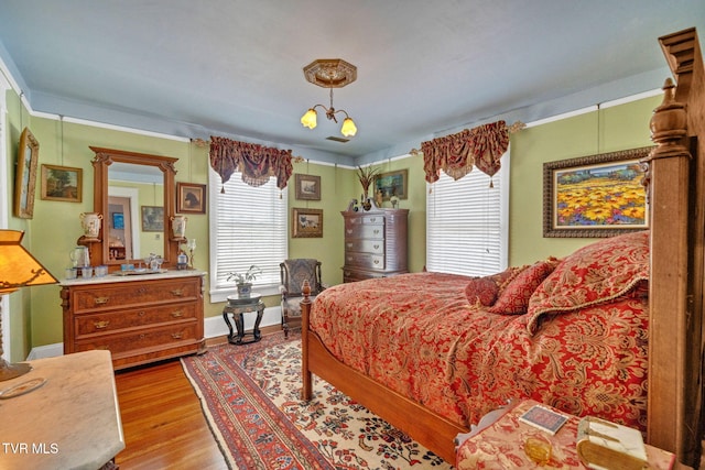 201 W Wanola Ave, Kingsport, TN 37660 - bedroom with multiple windows and wood finished floors