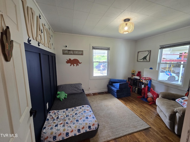 1358 Bristol Hwy, Elizabethton, TN 37643 - bedroom with ornamental molding and wood finished floors