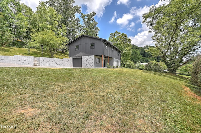 1091 Long Crescent Dr, Bristol, VA 24201 - back of property with a garage, a lawn, and brick siding