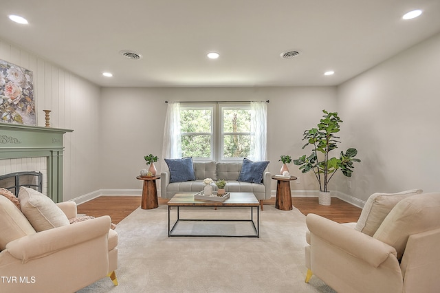 1091 Long Crescent Dr, Bristol, VA 24201 - living room featuring light wood-style flooring, recessed lighting, and a fireplace