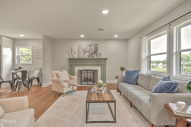 1091 Long Crescent Dr, Bristol, VA 24201 - living room featuring light wood-style flooring, recessed lighting, and a brick fireplace