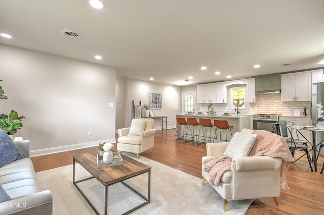 1091 Long Crescent Dr, Bristol, VA 24201 - living room with recessed lighting and light wood finished floors