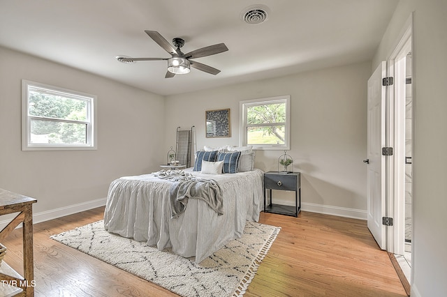 1091 Long Crescent Dr, Bristol, VA 24201 - bedroom with light wood finished floors and ceiling fan