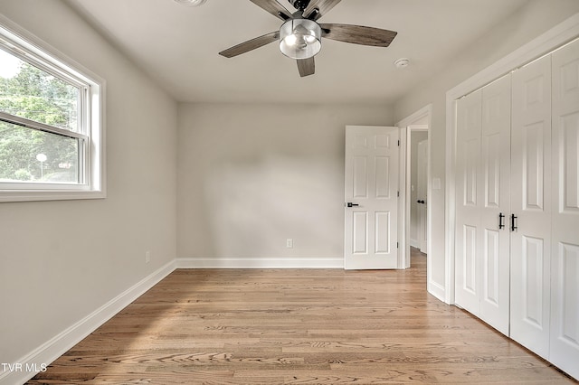 1091 Long Crescent Dr, Bristol, VA 24201 - unfurnished bedroom with light wood finished floors, a closet, and a ceiling fan