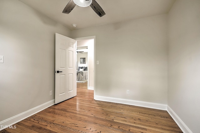 1091 Long Crescent Dr, Bristol, VA 24201 - empty room with a ceiling fan, wood finished floors, and a smoke detector