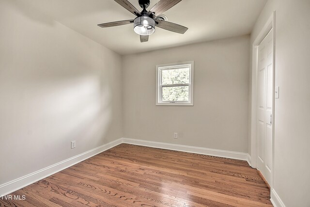 1091 Long Crescent Dr, Bristol, VA 24201 - spare room with wood finished floors and ceiling fan