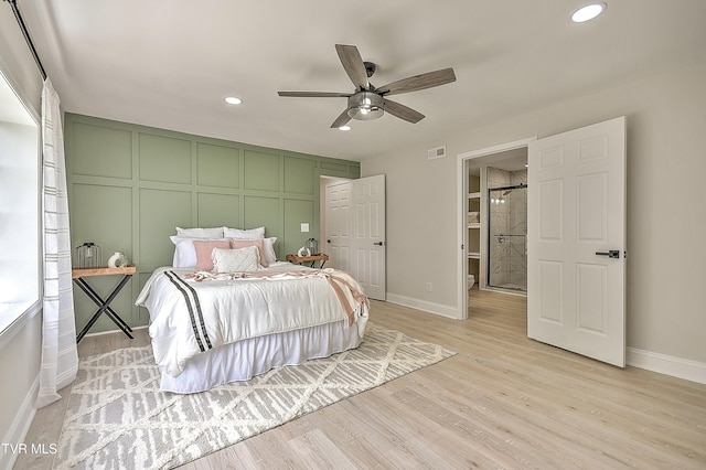 1091 Long Crescent Dr, Bristol, VA 24201 - bedroom with recessed lighting, light wood-type flooring, a decorative wall, and a ceiling fan