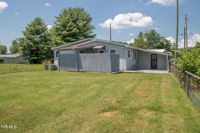 184 Center St, Bristol, VA 24201 - back of property featuring a fenced backyard and a patio area