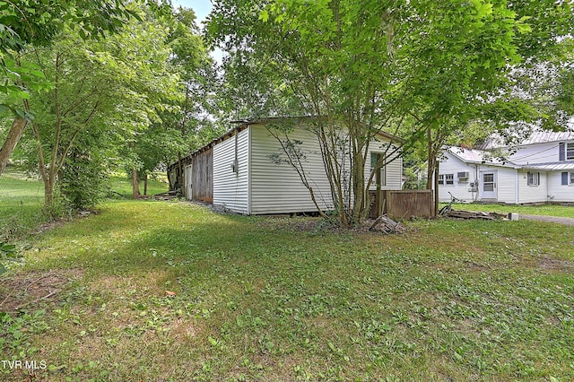 301 Keenburg Rd, Bluff City, TN 37618 - view of grassy yard featuring an outbuilding