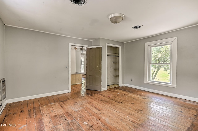 301 Keenburg Rd, Bluff City, TN 37618 - unfurnished bedroom with hardwood / wood-style floors and a closet