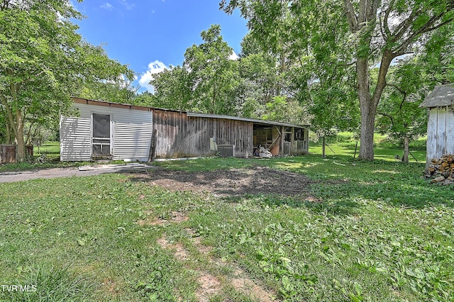 301 Keenburg Rd, Bluff City, TN 37618 - view of green lawn with an outbuilding