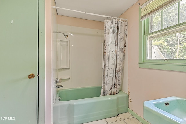 301 Keenburg Rd, Bluff City, TN 37618 - full bathroom with shower / bath combo and baseboards