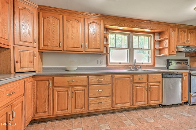 301 Keenburg Rd, Bluff City, TN 37618 - kitchen with open shelves, appliances with stainless steel finishes, under cabinet range hood, brown cabinets, and light stone finish flooring