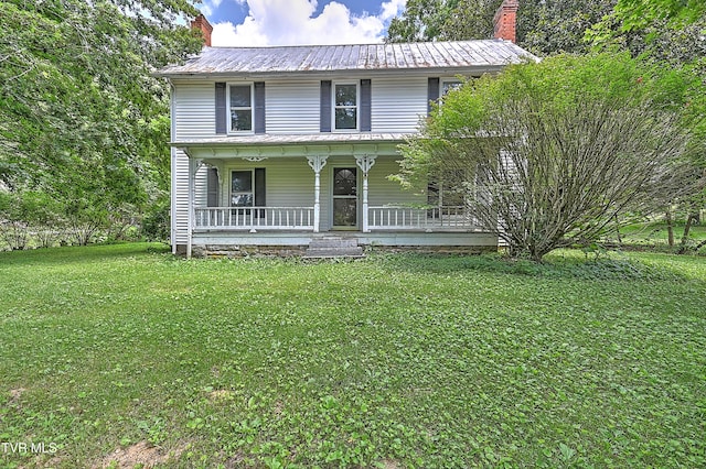 301 Keenburg Rd, Bluff City, TN 37618 - view of front of property with a chimney, covered porch, a front yard, and a metal roof