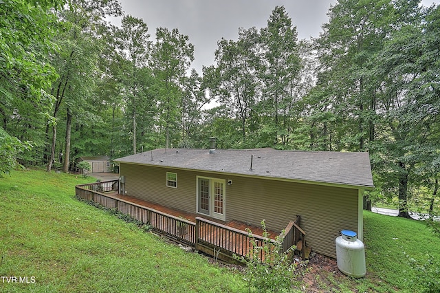 13275 Chip Ridge Rd, Abingdon, VA 24210 - back of property featuring a deck, a storage unit, a yard, and french doors