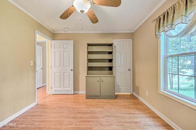 13275 Chip Ridge Rd, Abingdon, VA 24210 - unfurnished bedroom with crown molding, light wood finished floors, and a ceiling fan
