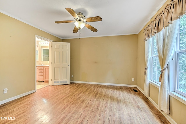 13275 Chip Ridge Rd, Abingdon, VA 24210 - spare room with light wood finished floors, crown molding, and ceiling fan