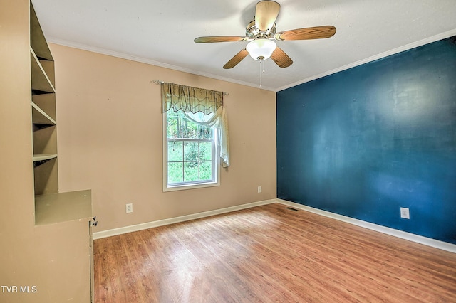 13275 Chip Ridge Rd, Abingdon, VA 24210 - unfurnished room with a ceiling fan, wood finished floors, and ornamental molding