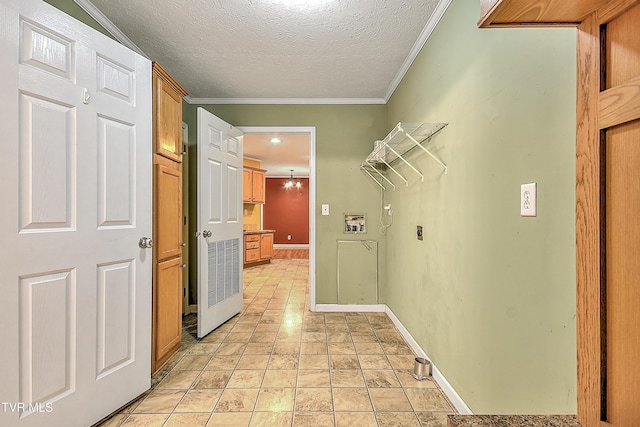 13275 Chip Ridge Rd, Abingdon, VA 24210 - laundry area featuring ornamental molding, a textured ceiling, and hookup for a washing machine