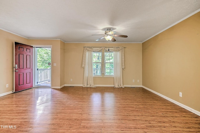 13275 Chip Ridge Rd, Abingdon, VA 24210 - spare room featuring a ceiling fan, light wood-style flooring, and crown molding