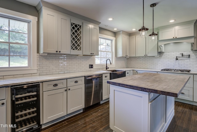 2 Longview Ln, Kingsport, TN 37660 - kitchen featuring wine cooler, dishwasher, dark wood-type flooring, tasteful backsplash, and recessed lighting