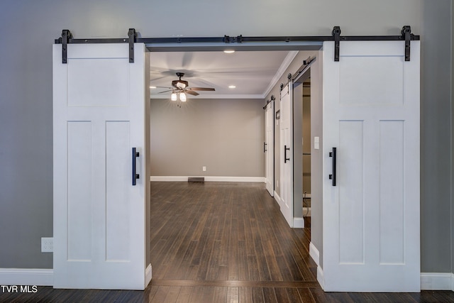 2 Longview Ln, Kingsport, TN 37660 - entryway with a barn door, a ceiling fan, dark wood-style flooring, ornamental molding, and recessed lighting