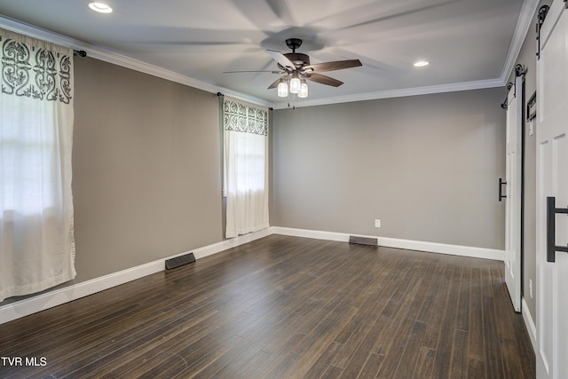 2 Longview Ln, Kingsport, TN 37660 - empty room with a barn door, a ceiling fan, recessed lighting, ornamental molding, and dark wood-style floors
