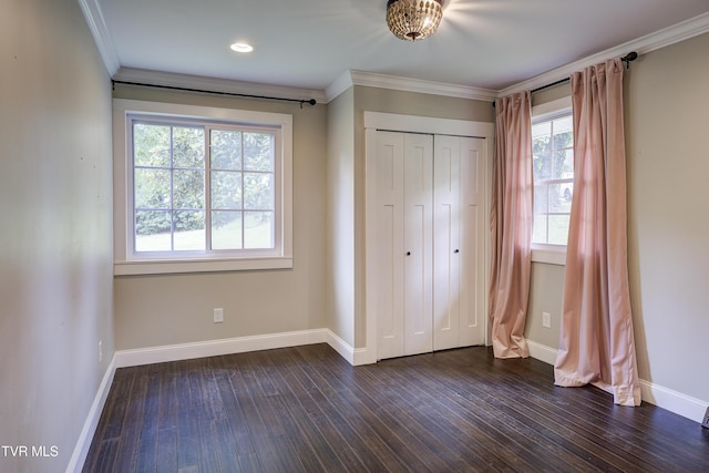 2 Longview Ln, Kingsport, TN 37660 - unfurnished bedroom with dark wood-type flooring, ornamental molding, and a closet