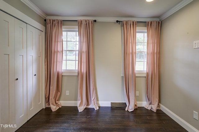 2 Longview Ln, Kingsport, TN 37660 - unfurnished bedroom with multiple windows, dark wood finished floors, crown molding, and a closet
