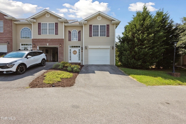 1824 King College Rd Unit E1, Bristol, TN 37620 - multi unit property with driveway, an attached garage, and brick siding