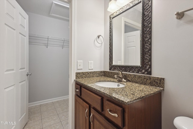 1824 King College Rd Unit E1, Bristol, TN 37620 - bathroom featuring vanity, tile patterned flooring, and a walk in closet