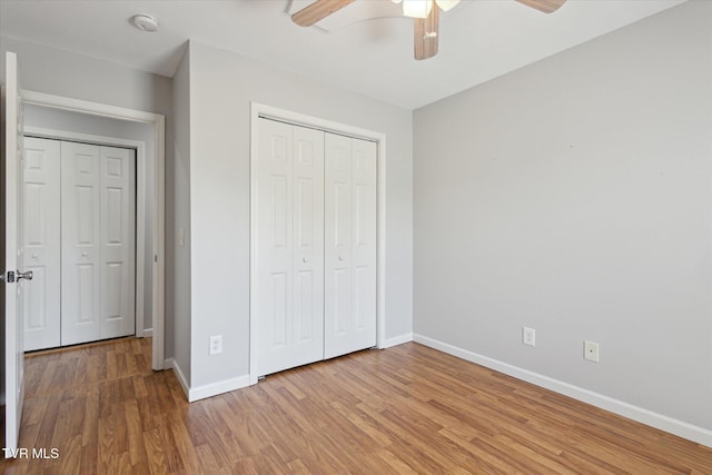 1824 King College Rd Unit E1, Bristol, TN 37620 - unfurnished bedroom with light wood-style flooring, a closet, and ceiling fan