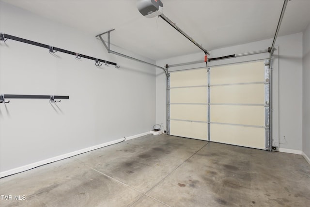 1824 King College Rd Unit E1, Bristol, TN 37620 - garage with a garage door opener and baseboards
