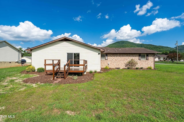 157 Spring St, Hampton, TN 37658 - rear view of house featuring a deck and a yard