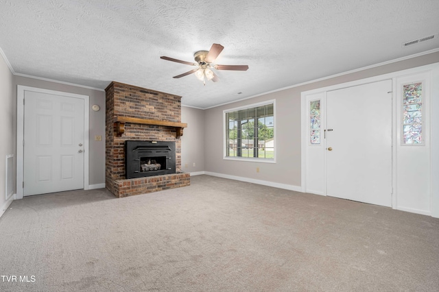 157 Spring St, Hampton, TN 37658 - unfurnished living room with a ceiling fan, crown molding, carpet floors, a brick fireplace, and a textured ceiling