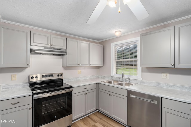 157 Spring St, Hampton, TN 37658 - kitchen featuring stainless steel appliances, under cabinet range hood, gray cabinetry, a textured ceiling, and a skylight