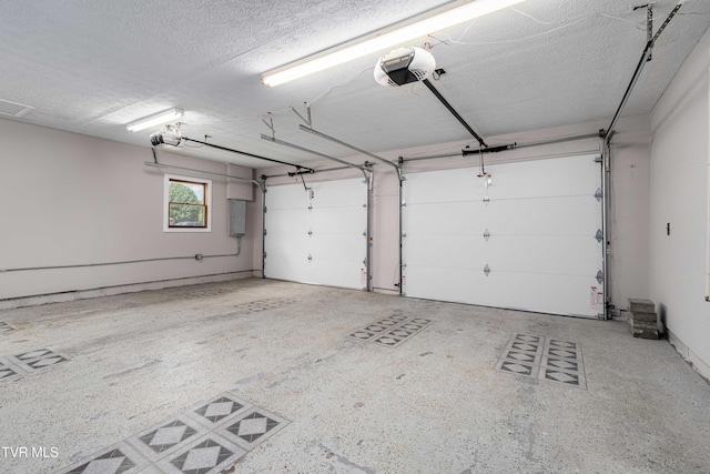 157 Spring St, Hampton, TN 37658 - garage with a garage door opener and electric panel