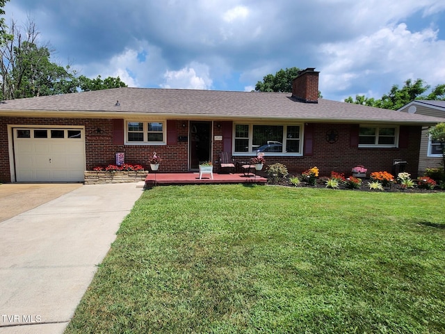 2020 Oakland St, Kingsport, TN 37660 - ranch-style house with brick siding, a garage, driveway, and a chimney