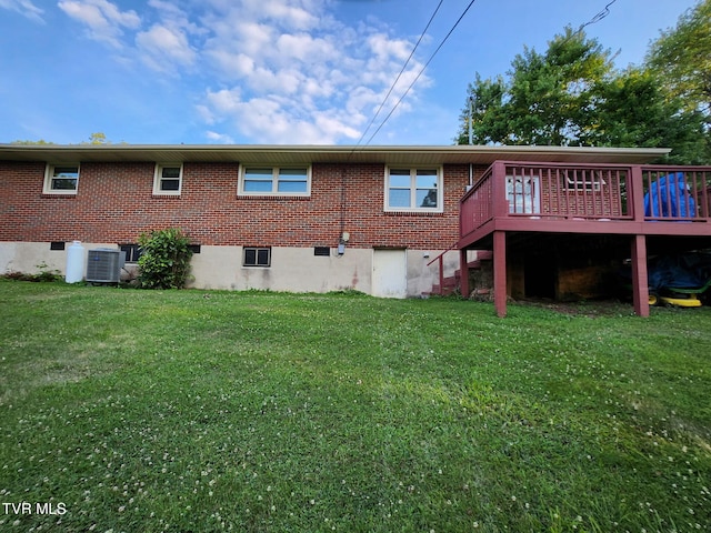 2020 Oakland St, Kingsport, TN 37660 - rear view of property with a yard, a wooden deck, and brick siding