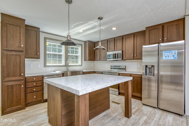 8492 Reedy Creek Rd, Bristol, VA 24202 - kitchen featuring appliances with stainless steel finishes, light wood finished floors, light countertops, and recessed lighting