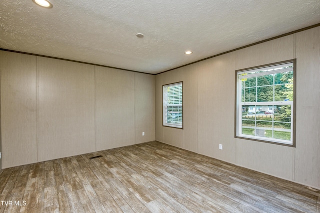 8492 Reedy Creek Rd, Bristol, VA 24202 - empty room featuring wood finished floors and a textured ceiling