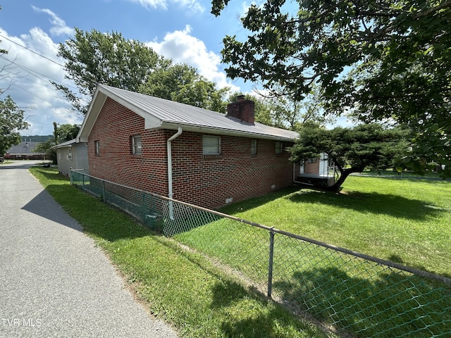 406 NE Mason Ave, Wise, VA 24293 - view of side of property with brick siding, a chimney, and a metal roof