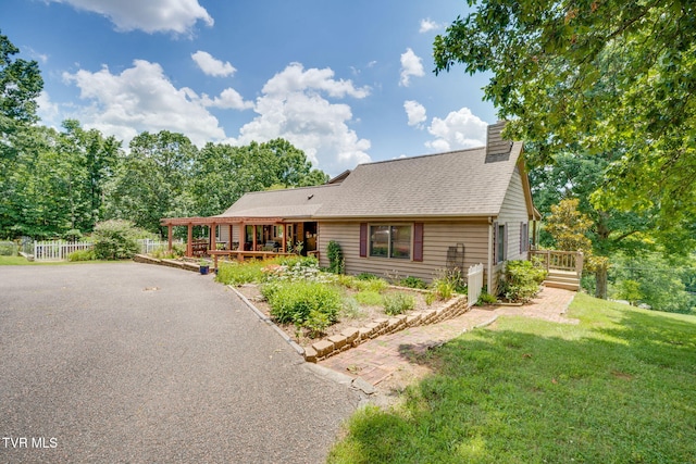236 Wadlow Gap Rd, Kingsport, TN 37660 - view of front facade featuring a chimney, a wooden deck, and a shingled roof